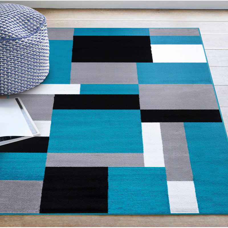 Ebern Designs Tarra Tufted Teal/Black/White Indoor/Outdoor Rug
